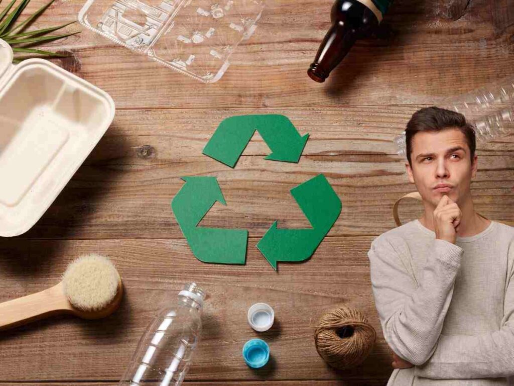 Persona che ha dubbi sul riciclo